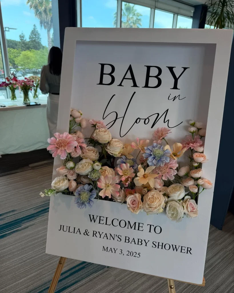 baby in bloom shower sign